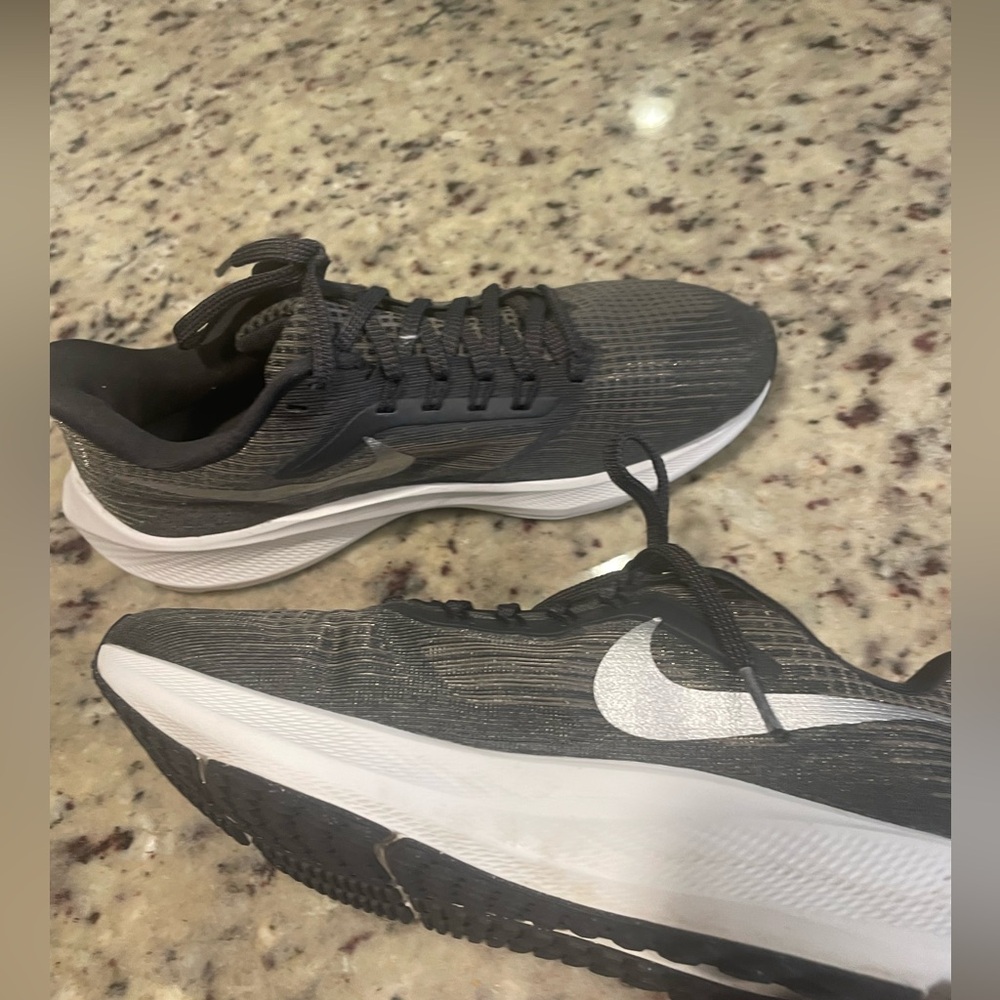 Nike Black and White Athletic Sneakers (with gold and silver accents)